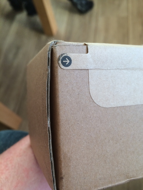External packaging with tab for ease of open